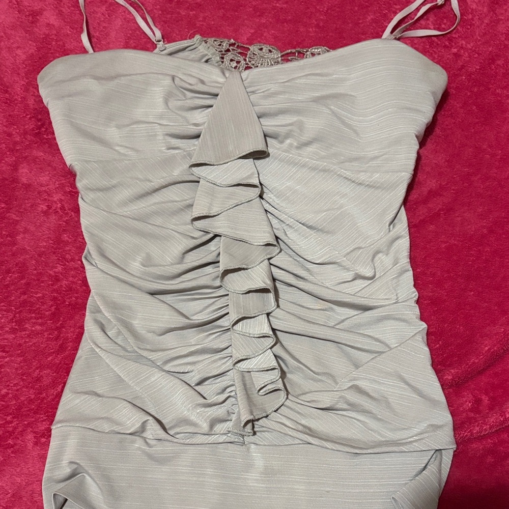 Runched sequin hearts ruffle top